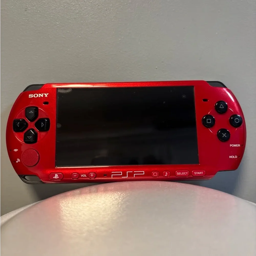 Sony Handheld Console in Vivid Red and Black